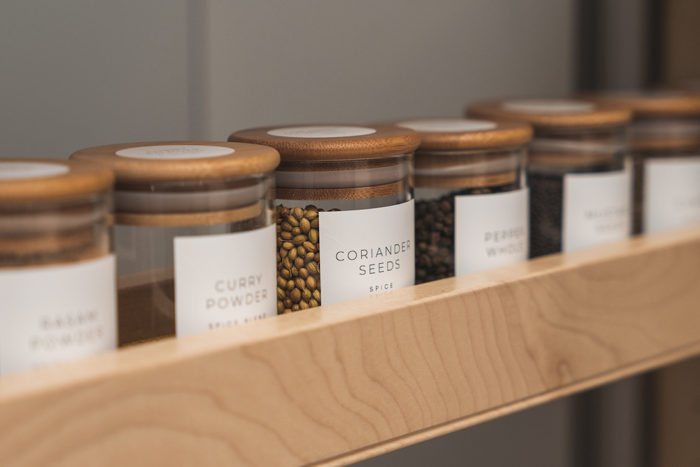 An organized cabinet of spices