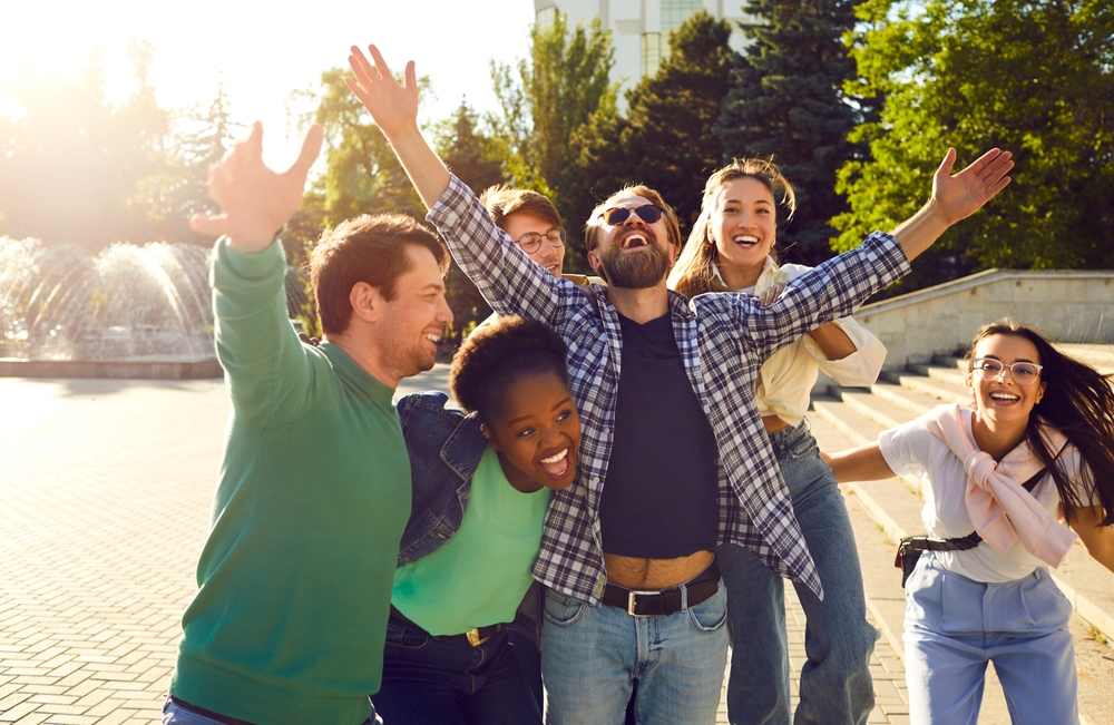 Diverse friend group hanging out at their apartments in westwood