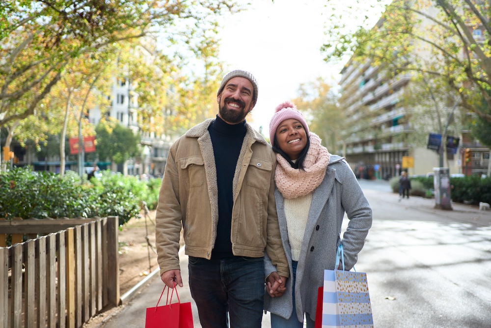 Couple enjoying shopping near their apartments in Westwood